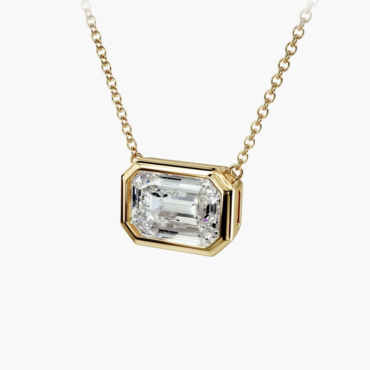 East West Emerald Cut Bezel Diamond Pendant