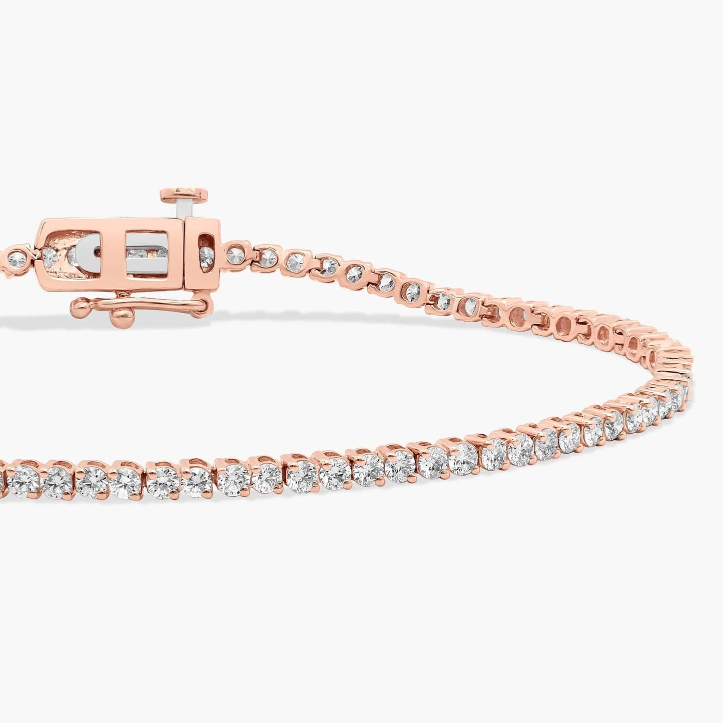 Classic Two Prong Round Diamond Tennis Bracelet in Rose Gold